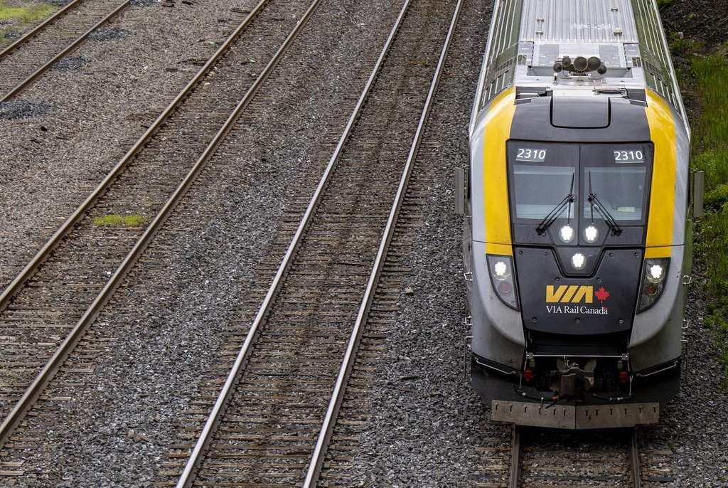 A VIA Rail train struck a snowplow in Scarborough, causing major VIA and GO Transit delays. No injuries were reported and tracks have since reopened. 