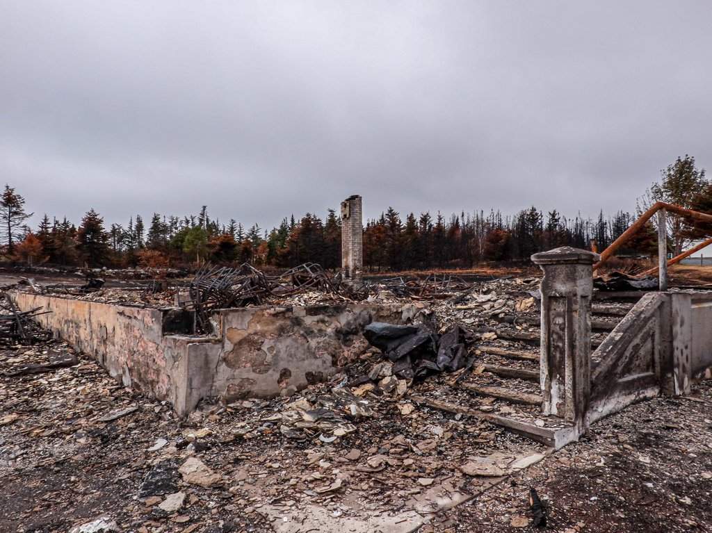 The ruins of a historic building in Small Point-Adam's Cove-Blackhead-Broad Cove, N.L. are shown on Friday August 29, 2025 following the Conception Bay North wildfire.