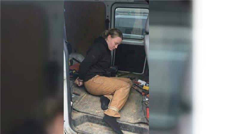 A fake AI image generated to make it appear Deeanna Erickson is tied up in a van.