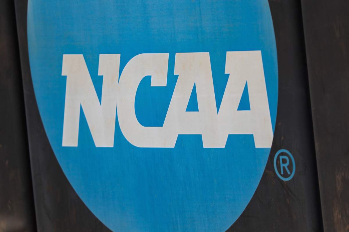 NCAA logo displayed on the fence before an NCAA softball game between Jacksonville and FGCU, Sunday, March 24, 2024, in Jacksonville, Fla.
