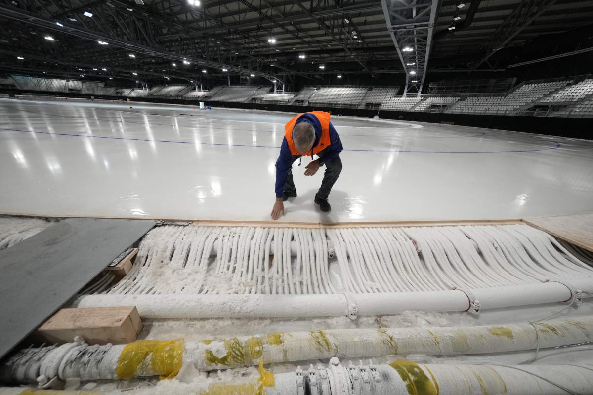 Ice Master Mark Messer poses in the stadium where the speed skating competitions will take place at the 2026 Winter Olympic Games on the outskirts of Milan, Italy.