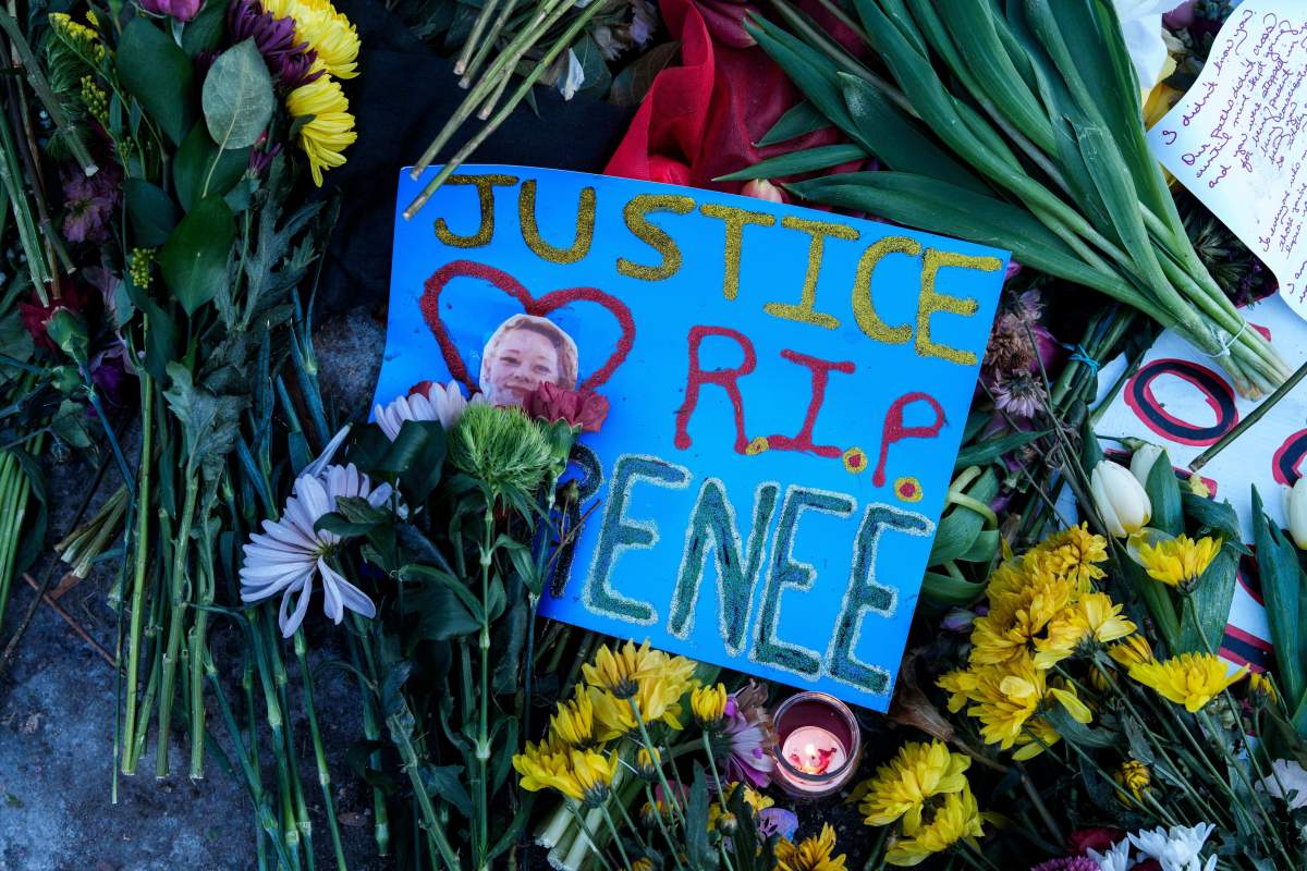 Tributes are left at a makeshift memorial for Renee Good, who was fatally shot by an ICE officer last week in Minneapolis.