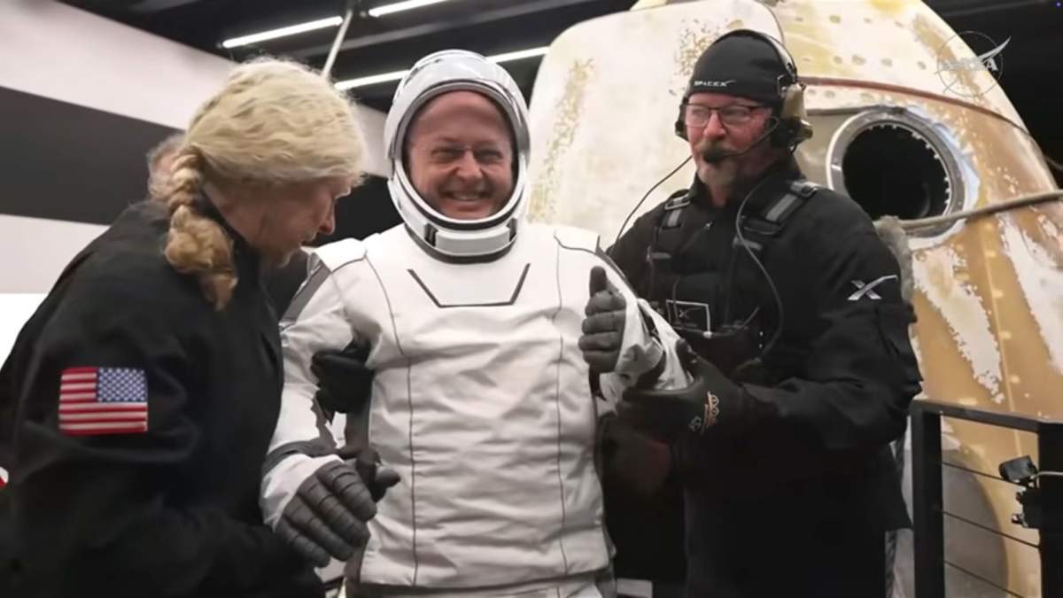 This screengrab from video provided by NASA shows NASA astronaut Mike Fincke getting helped out of the SpaceX Crew-11 capsule.