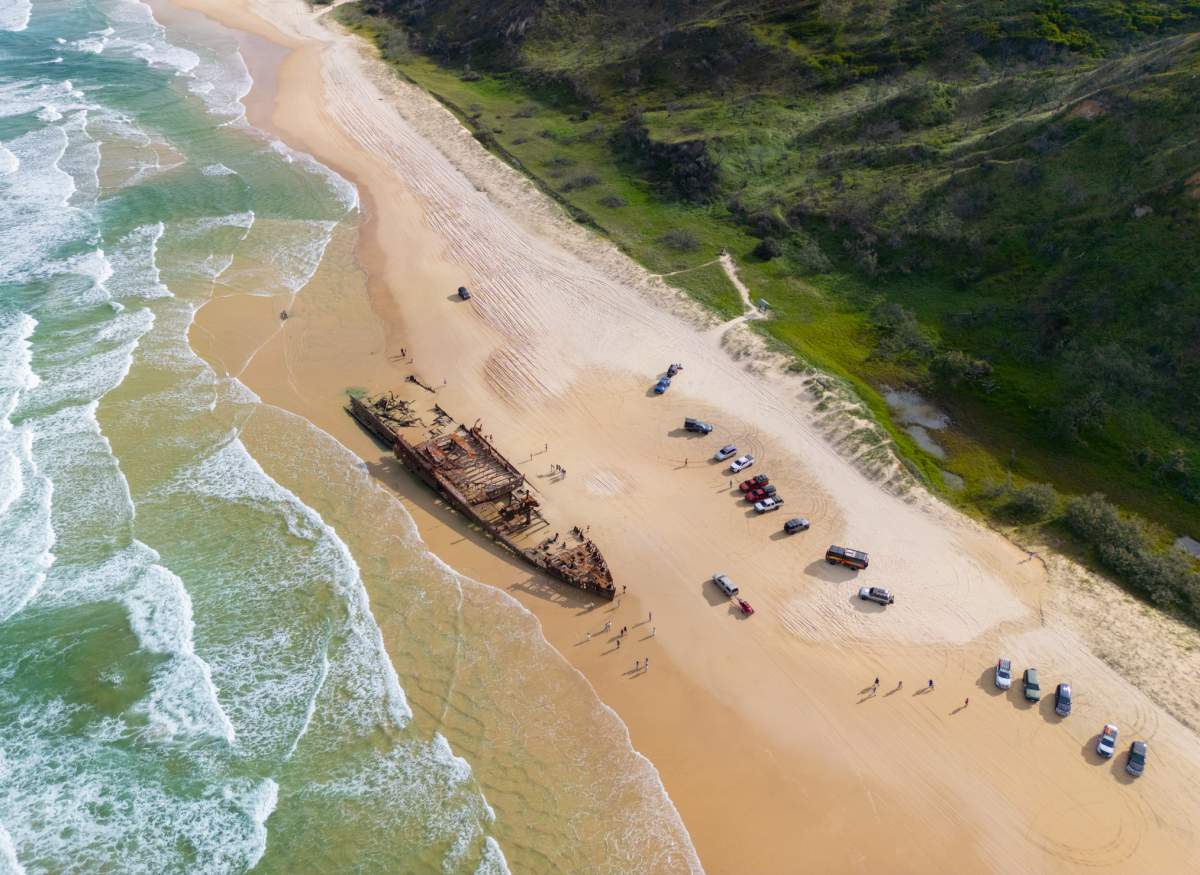Aerial view of the S.S. Maheno Shipwreck along 75 mile beach on the sand island of Kgari, Queensland, Australia.
