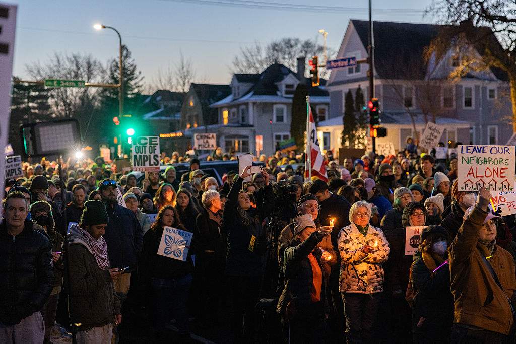 Community members in Minneapolis during a vigil following a fatal shooting by an Immigration and Customs Enforcement (ICE) agent in Minneapolis, Minnesota, US, on Wednesday, Jan. 7, 2026.
