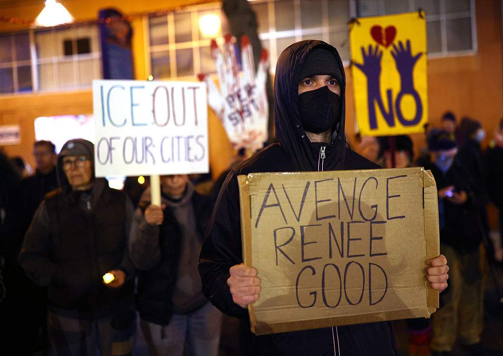 Protesters take part in a vigil for Renee Nicole Macklin Good at Fruitvale Plaza Park in Oakland, Calif., on Wednesday, Jan. 7, 2026.