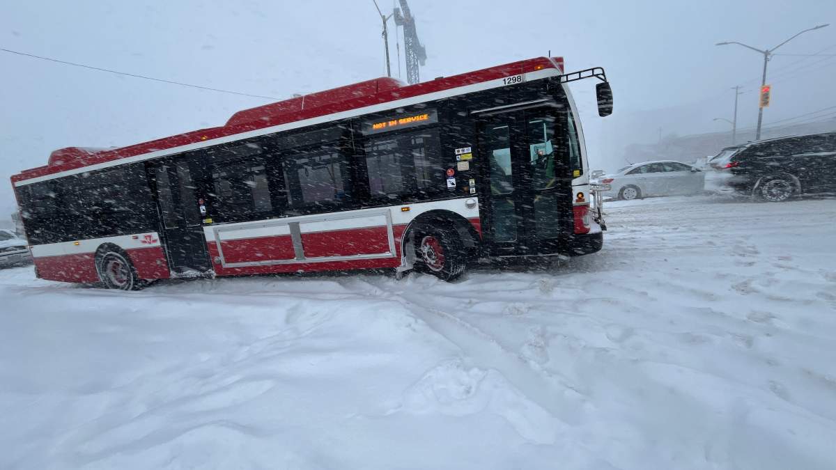 A TTC bus is seen stuck on McCowan and Sheppard due to slippery and icy road conditions.