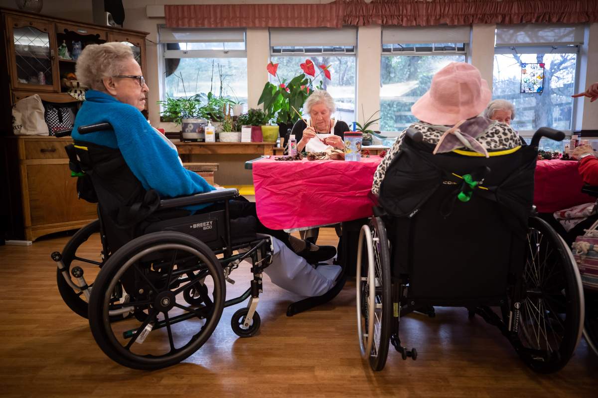 FILE -- Two women in a long-term care home paint at a table on Thursday, December 16, 2021. Life expectancy rose in Canada in 2024, almost back to pre-pandemic levels. THE CANADIAN PRESS/Darryl Dyck.