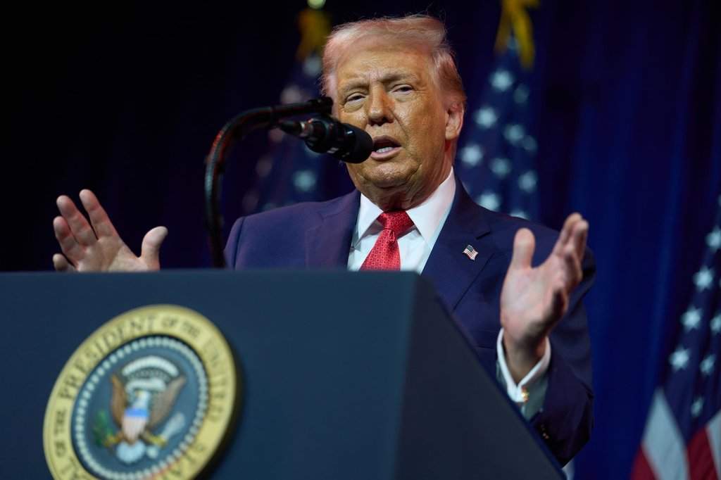 U.S. President Donald Trump speaks to House Republican lawmakers during their annual policy retreat, Tuesday, Jan. 6, 2026, in Washington. (AP Photo/Evan Vucci).
