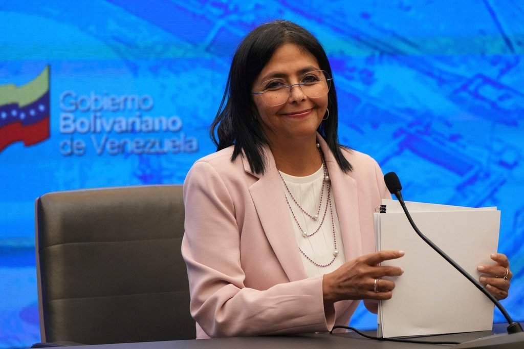 FILE – Venezuelan Vice President Delcy Rodriguez smiles during a press conference at the Miraflores presidential palace in Caracas Venezuela, Nov. 18, 2024. (AP Photo/Ariana Cubillos, File)