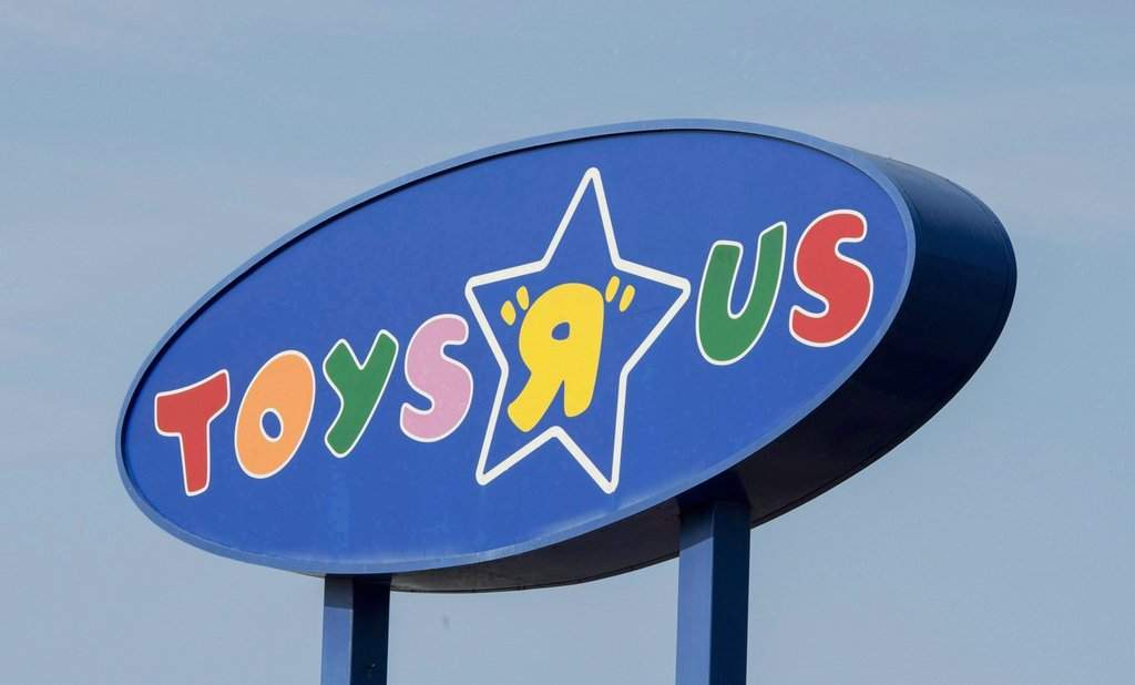 A Toys "R" Us sign is seen in Montreal on Sept. 19, 2017. THE CANADIAN PRESS/Paul Chiasson.
