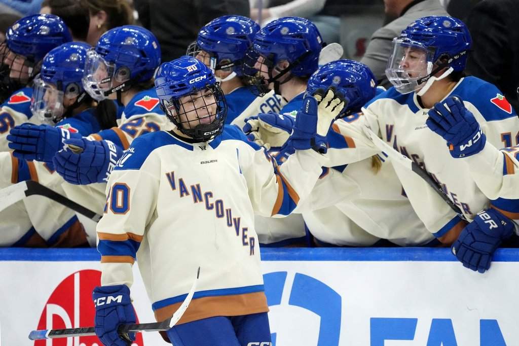 Vancouver Goldeneyes forward Sarah Nurse (20) celebrates her goal with teammates on the bench during second period PWHL hockey action against the Toronto Sceptres, in Toronto, Saturday, Jan. 17, 2026. THE CANADIAN PRESS/Frank Gunn.