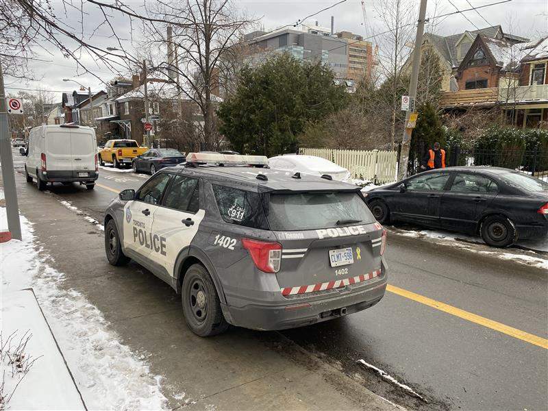 A police vehicle sits near the scene of a stabbing at Bellevue Avenue and College Street on Jan. 4, 2026.