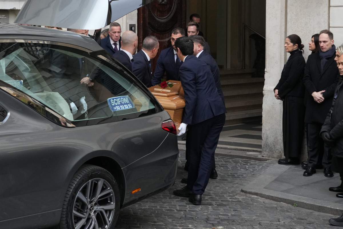 The coffin carrying fashion designer Valentino Garavani arrives in Valentino headquarters.