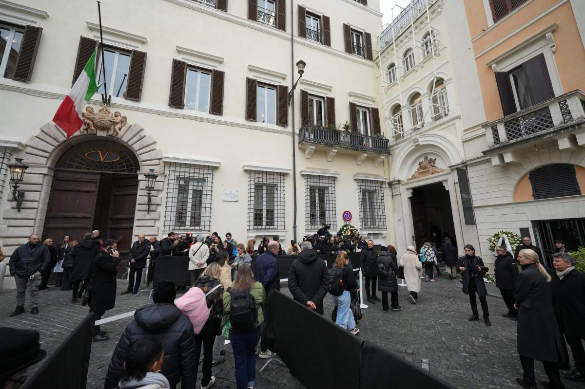 Mourners gather to pay respects to Valentino Garavani.
