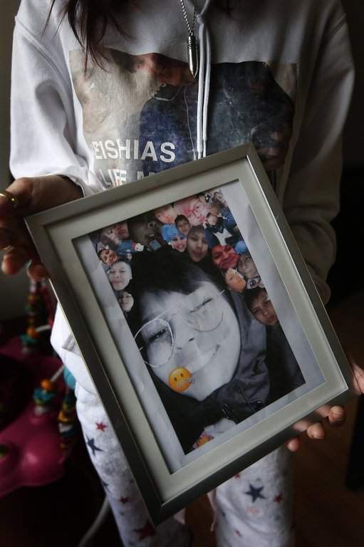 Christie Zebrasky, whose daughter Eishia Hudson was shot dead by police on April 8, 2020, holds a photo of her daughter in Winnipeg, Friday, December 11, 2020.  