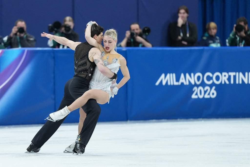 Piper Gilles and Paul Poirier of Team Canada compete in the Figure Skating Ice Dance Rhythm Dance event during the 2026 Milan Cortina Winter Olympics in Milan, Italy on Monday, February 9, 2026. THE CANADIAN PRESS/Nathan Denette.