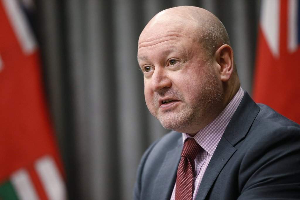 Dr. Brent Roussin, Manitoba chief public health officer, speaks at the Manitoba legislature in Winnipeg on Wednesday, Dec. 16, 2020. THE CANADIAN PRESS/John Woods