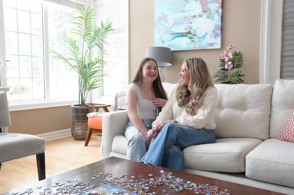 Susan Simpson sits with her daughter Ruby Johnston in their home in Whitchurch-Stouffville, Ont., on Friday, Feb. 6, 2026. THE CANADIAN PRESS/Chris Young.