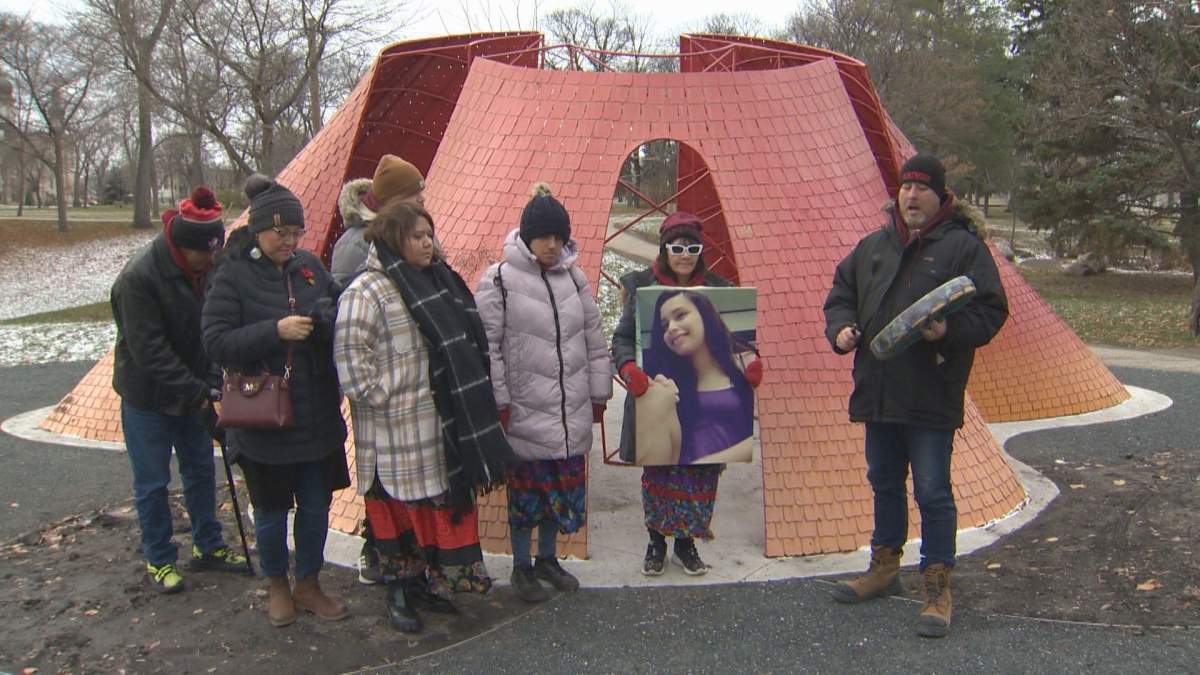 Rebecca Contois’ family at the Rainbow Butterfly monument in St. John’s Park.