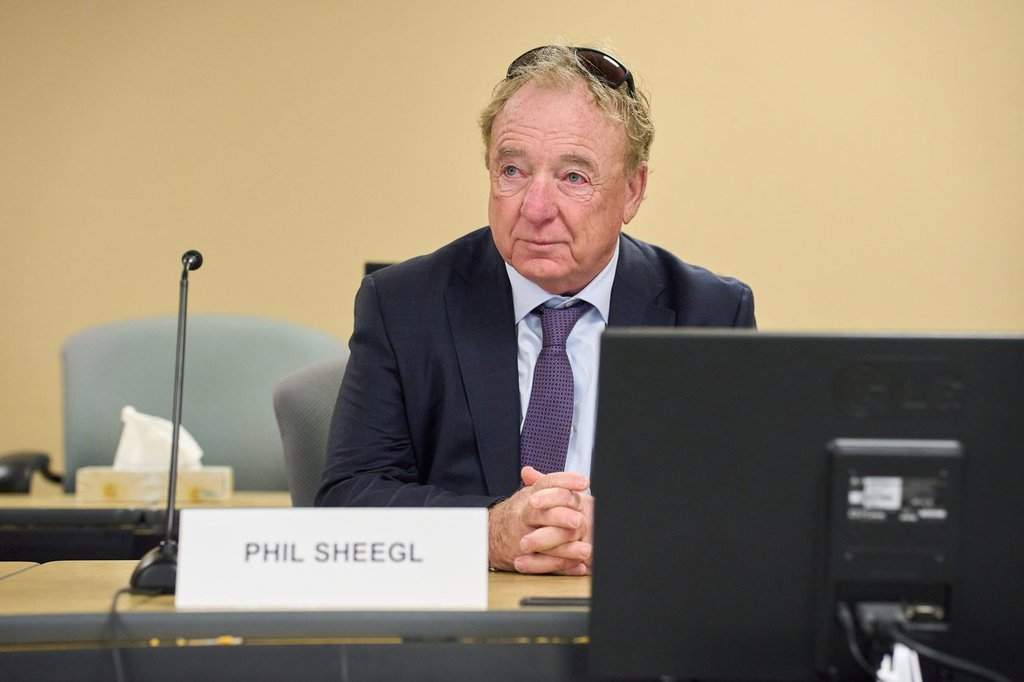 Winnipeg's former chief administrative officer, Phil Sheegl, arrives at the Winnipeg Police Service Headquarters Inquiry at the Public Utilities Board offices, in Winnipeg, on Tuesday, Feb. 17, 2026. 