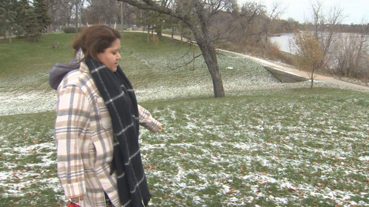 Stephanie Contois walks through St. John’s Park in Winnipeg. She said her sister Rebecca loved going for walks and that she always thought she was safe.