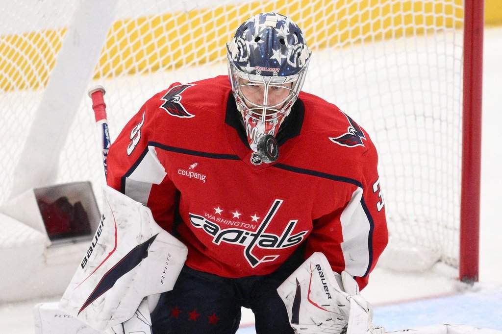 Washington Capitals goaltender Clay Stevenson stops the puck during the third period of an NHL hockey game against the New York Islanders, Monday, Feb. 2, 2026, in Washington. (AP Photo/Nick Wass).