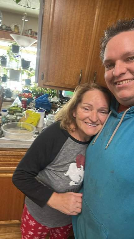 Angie Tuffnell, 70, with her 37-year-old son Shawn Tuffnell are shown in an undated photo. Shawn Tuffnell says he wrestled a moose before shooting it to death to save his mother after the animal chased her down on her acreage near Bienfait, Sask. THE CANADIAN PRESS/Handout - Shawn Tuffnell (Mandatory Credit).