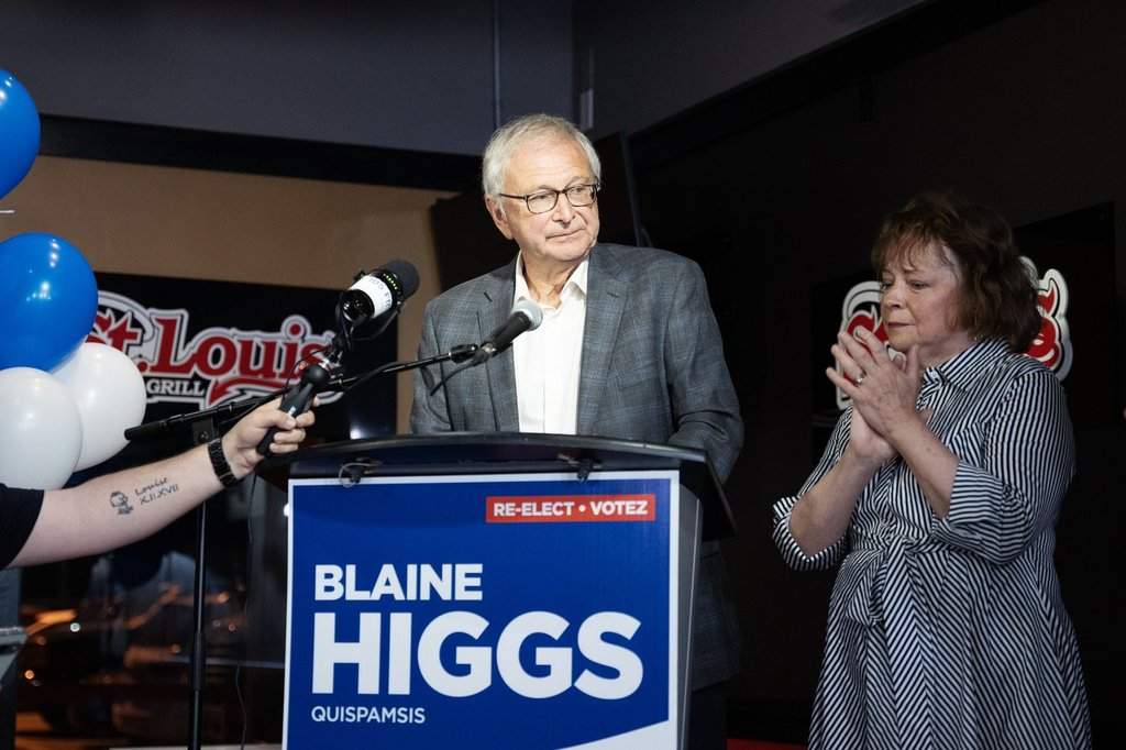 New Brunswick Progressive Conservative Party Leader Blaine Higgs delivers a concession speech with his Marcia Higgs in Quispamsis, N.B., following the results of the provincial election, Monday, Oct. 21, 2024. 