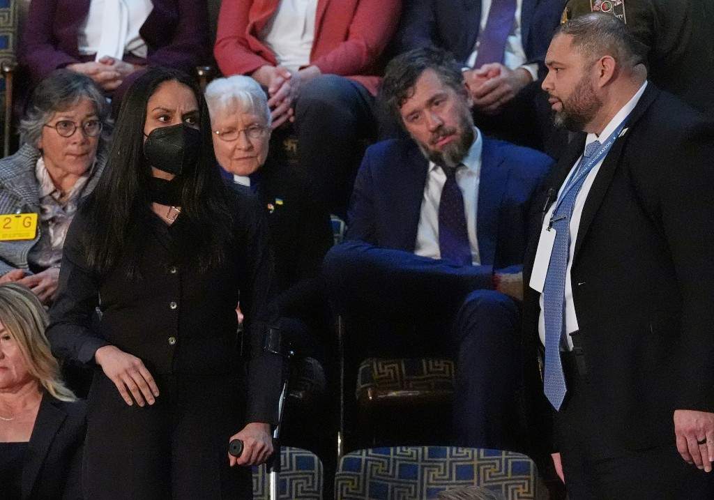 Aliya Rahman is removed from the House chamber as President Donald Trump delivers the State of the Union address to a joint session of Congress at the U.S. Capitol in Washington, Tuesday, Feb. 24, 2026.