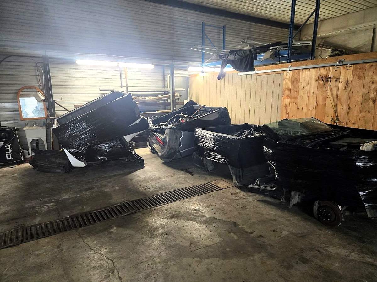 Peterborough County OPP say a chop shop was operating in the Buckhorn area where up parts of 13 stolen vehicles were found cut and wrapped for shipment.