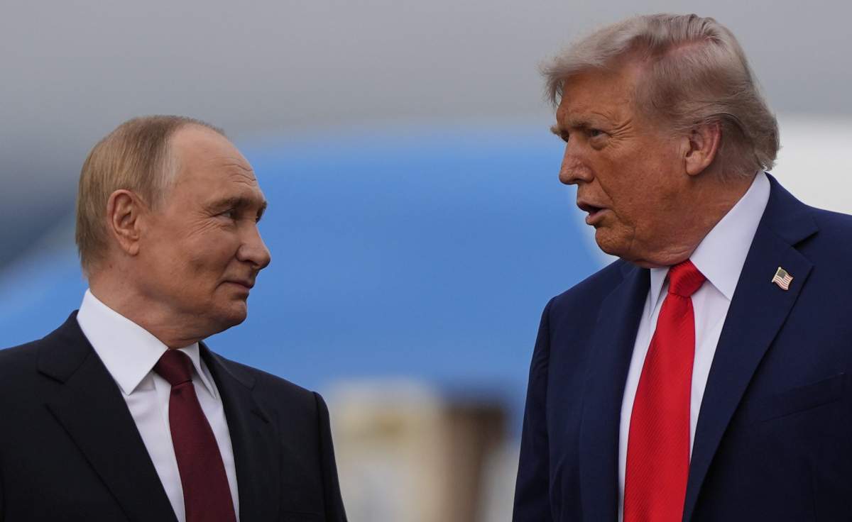 President Donald Trump talks with Russia's President Vladimir Putin Friday, Aug. 15, 2025, at Joint Base Elmendorf-Richardson, Alaska. (AP Photo/Julia Demaree Nikhinson).