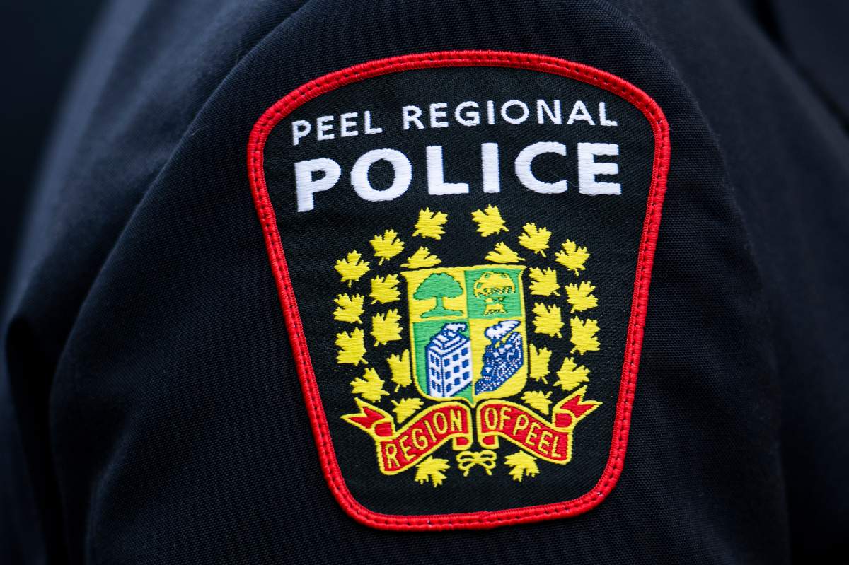 Peel police say a four-year-old child has died after being found on the ground outside an apartment building in Mississauga.