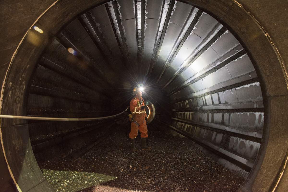A worker stands inside a scrubber in this handout photo at the Gahcho Kue diamond mine in the Northwest Territories, in March of 2018.