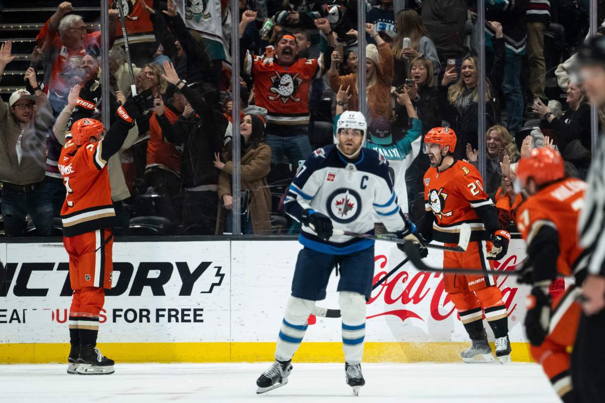 Anaheim Ducks left wing Chris Kreider (20) reacts after scoring game-winning goal during the overtime of an NHL hockey game against the Winnipeg Jets, Friday, Feb. 27, 2026, in Anaheim, Calif. (AP Photo/Kyusung Gong).