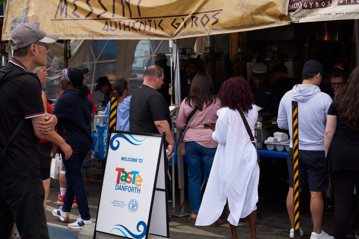 People attend Taste of the Danforth in Toronto on Aug. 13, 2023.