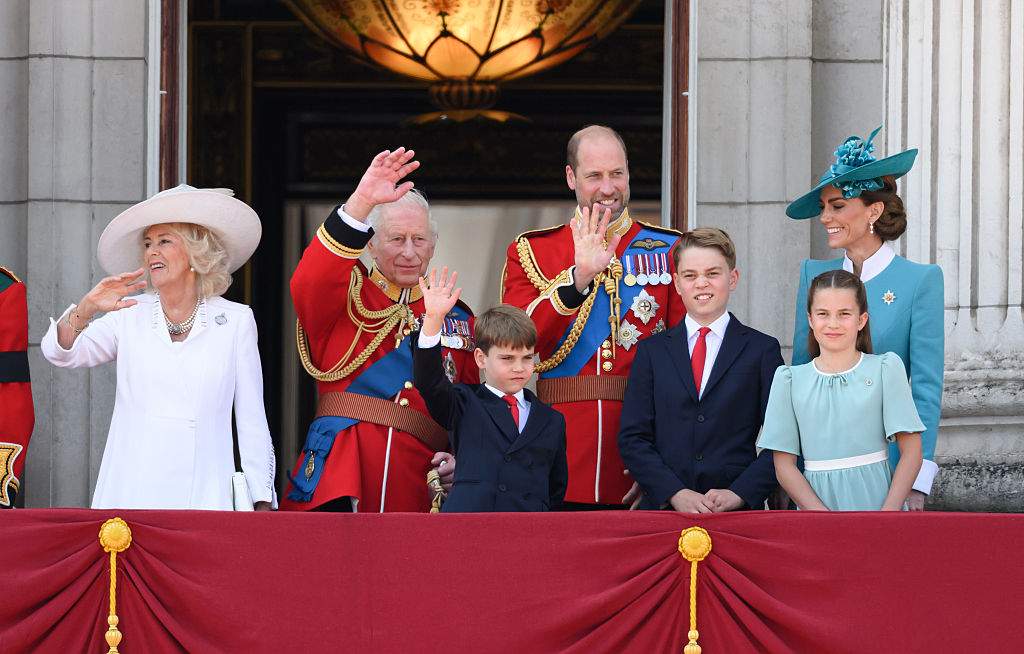 FILE - Queen Camilla, King Charles III, Prince Louis of Wales, Prince William, Prince of Wales, Prince George of Wales, Catherine, Princess of Wales and Princess Charlotte of Wales on the balcony at Buckingham Palace during Trooping The Colour 2025 on June 14, 2025 in London, England.