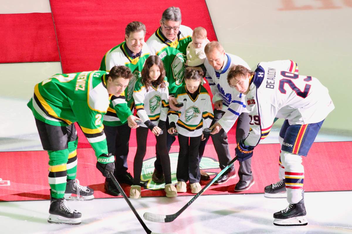 London, Ont. - Brandon Prust, Jim Sandlak and Rocky Farr take part in the ceremonial faceoff after being inducted into the Don Brankely London Knights Hall of Fame on Feb. 20, 2026 at Canada Life Place.
