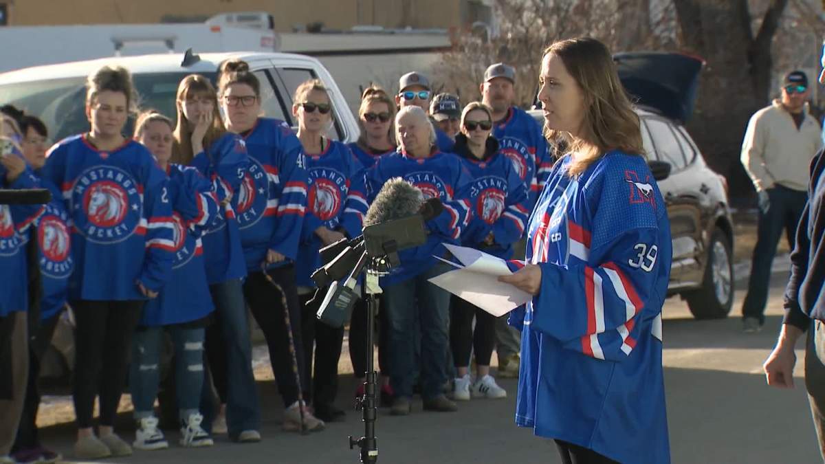 The mayor the Nanton, whose family is also amongst the billet families for players on the Southern Alberta Mustangs, was accompanied by a large group of supporters as she spoke to the media outside the Stavely arena on Tuesday.