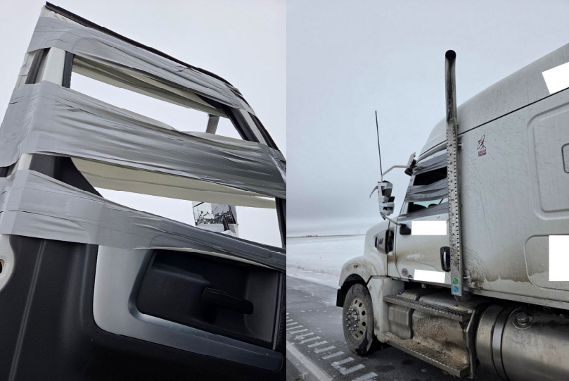 Image of the semi-truck with no window and duct tape over it.