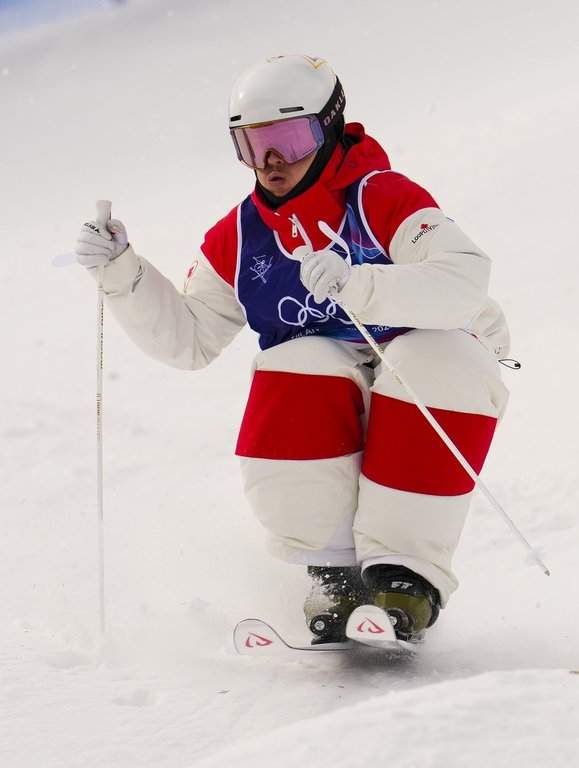 Canada's Mikael Kingsbury from Deux-Montagnes, Que., competes in the men's moguls qualification at the Milano Cortina 2026 Winter Olympic Games in Livigno, Italy on Tuesday, Feb. 10, 2026. THE CANADIAN PRESS/Sean Kilpatrick.