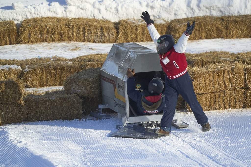 Adeo Kodra of the University of British Columbia Okanagan celebrates after a run at the 2026 Great Northern Concrete Toboggan Race at Boler Mountain in London, Ont. on Saturday, Feb. 7, 2026. The annual competition brings together engineering schools from across Canada to race their toboggans. THE CANADIAN PRESS/ Geoff Robins.