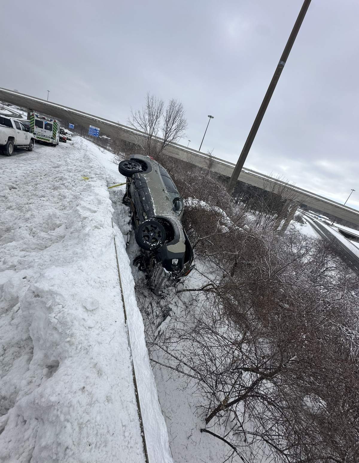 OPP say a vehicle lost control on icy roads and struck snow on the shoulder, causing it to climb over the guard rail and come to rest in the trees on Jan. 30.