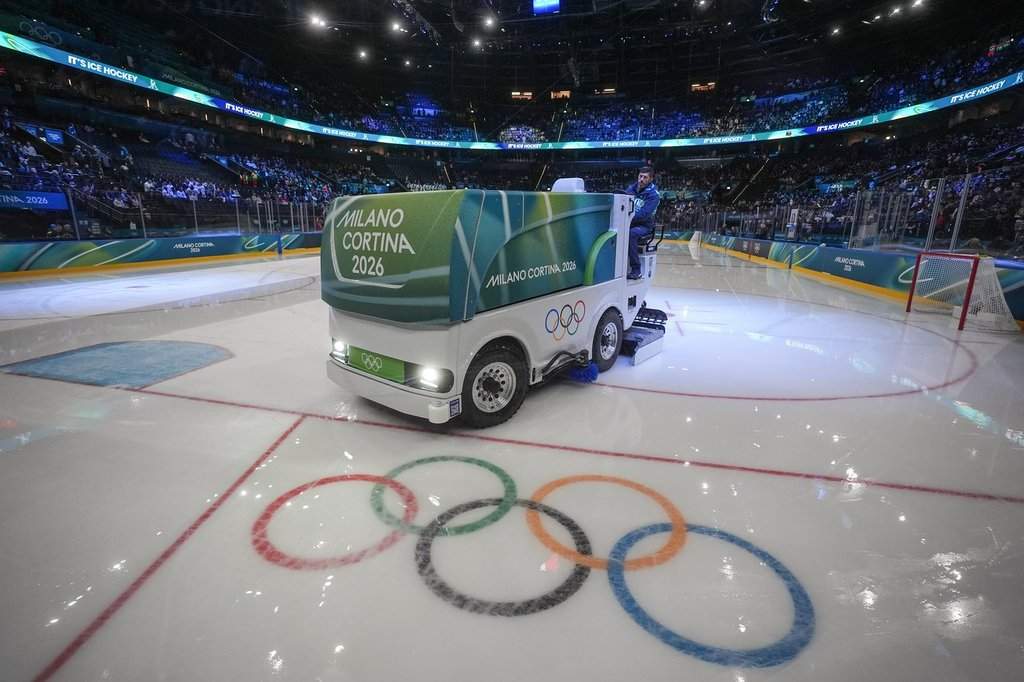 An electric Zamboni is used to resurface the ice before Italy and France play a women's hockey game at the Milano Santagiulia ice hockey arena at the Milan Cortina Winter Olympics, in Milan, on Thursday, Feb. 5, 2026. THE CANADIAN PRESS/Darryl Dyck.