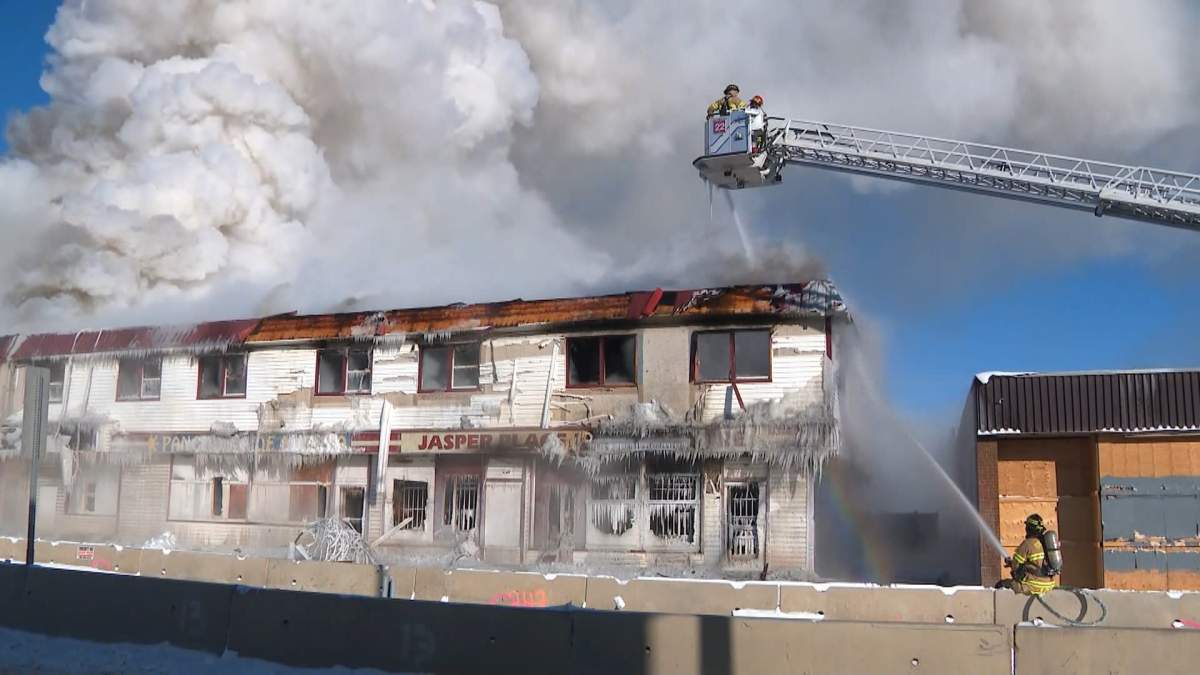 Edmonton firefighters could be seen pouring a steady stream of water on the hotel as they fought to get the fire under control.