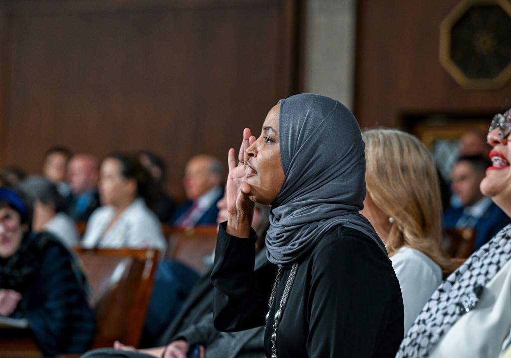 Rep. Ilhan Omar, D-Minn., reacts as President Donald Trump gives his State of the Union address to a joint session of Congress, at the Capitol in Washington, Tuesday, Feb. 24, 2026.