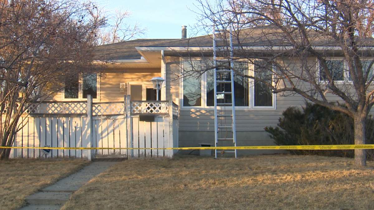 RCMP say when officers arrived the discovered a man armed with a shovel, baseball bat and a knife who had climbed up onto the roof of the home.
