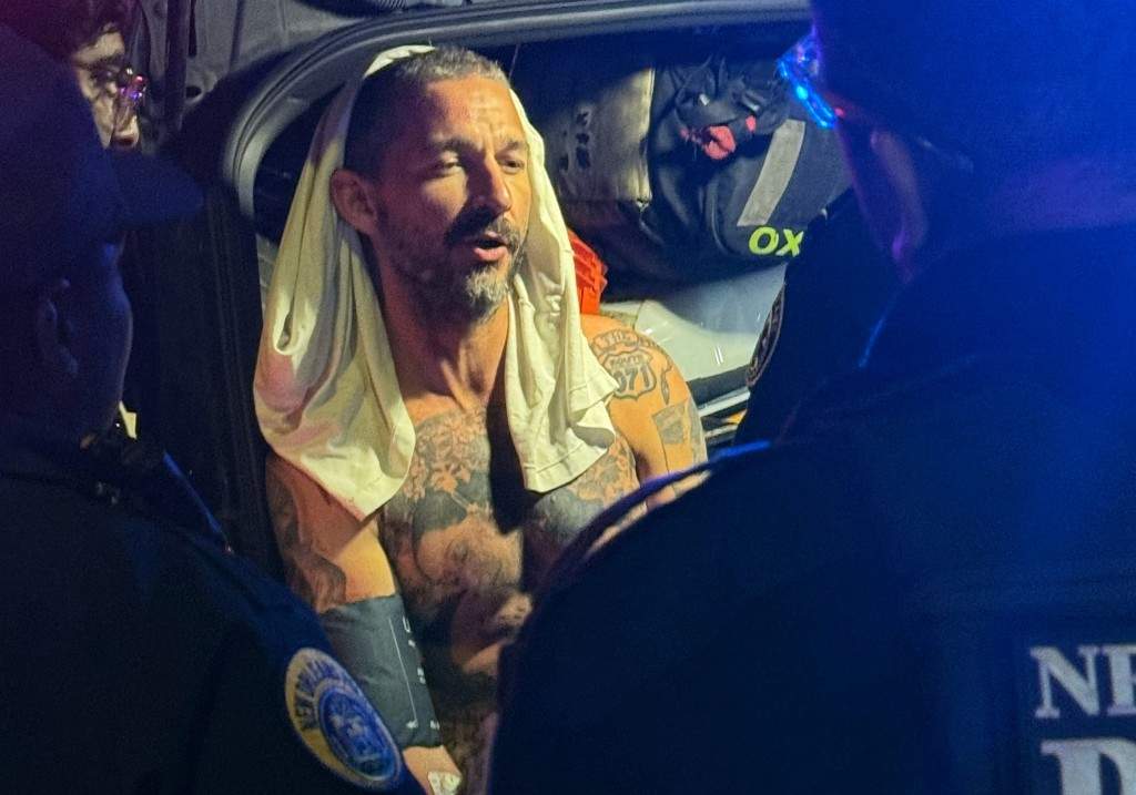 In this photo provided by entertainer Jeffrey Damnit, actor Shia LaBeouf is taken into police custody in New Orleans on Tuesday, Feb. 17, 2026, after allegedly hitting multiple people outside a bar.