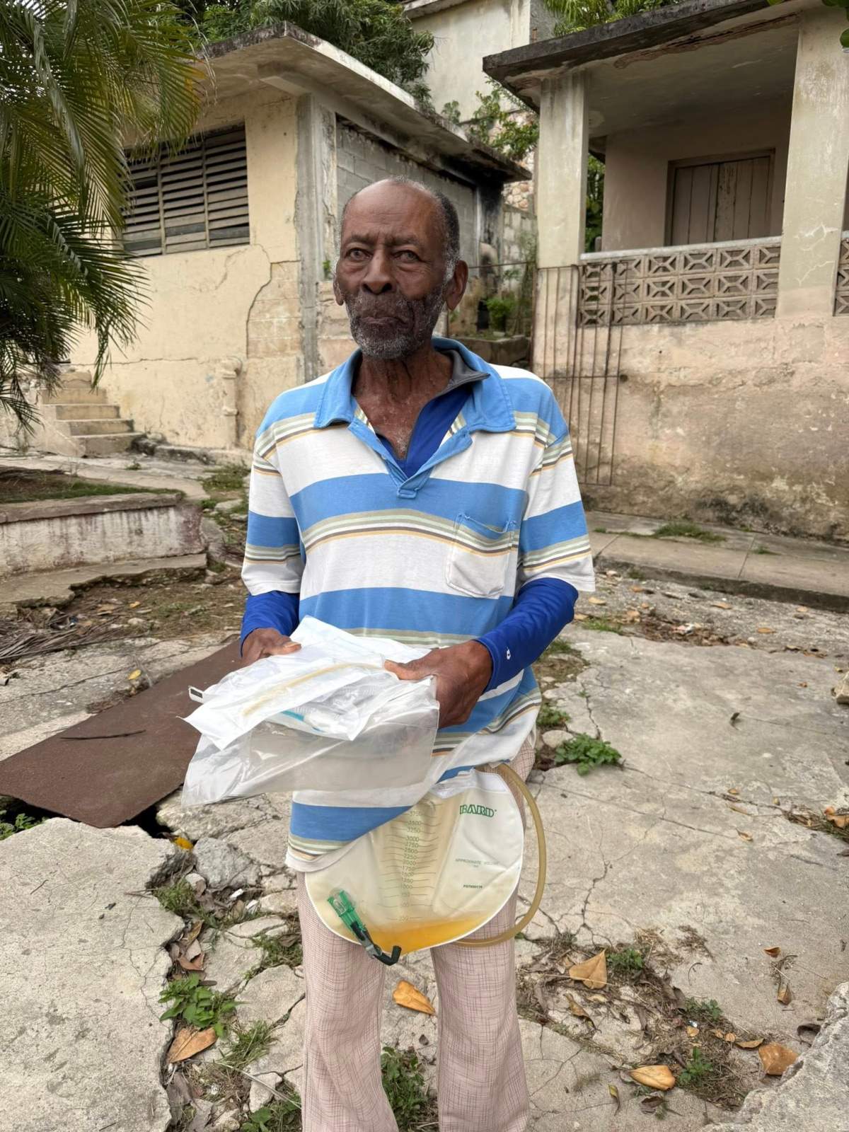 A sick man receiving aid from Canadian humanitarian group “Together for Cuba.”