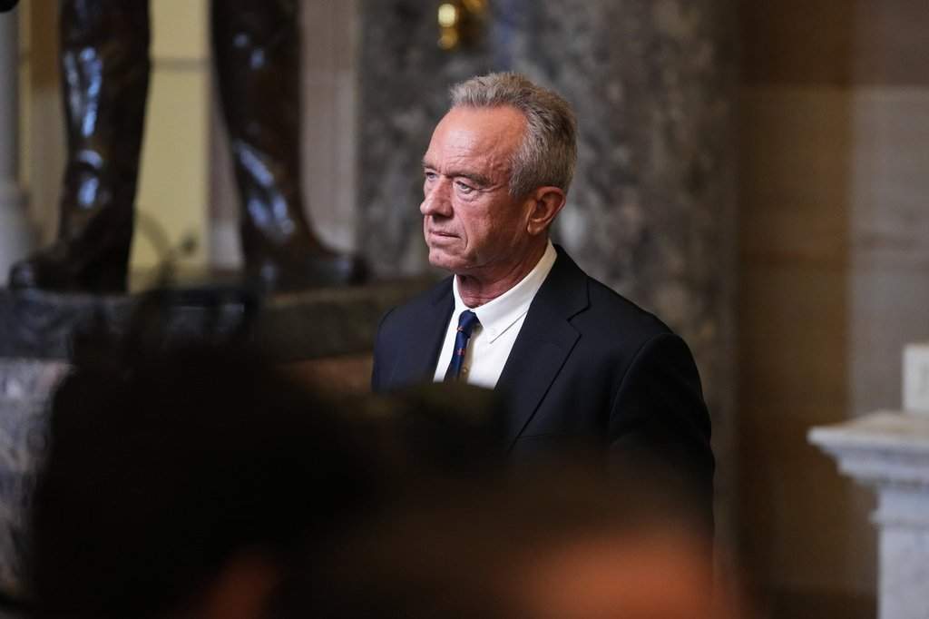 Health and Human Services Secretary Robert F. Kennedy Jr. is seen following President Donald Trump's State of the Union address to a joint session of Congress in the House chamber at the U.S. Capitol in Washington, Tuesday, Feb. 24, 2026. (AP Photo/Allison Robbert).